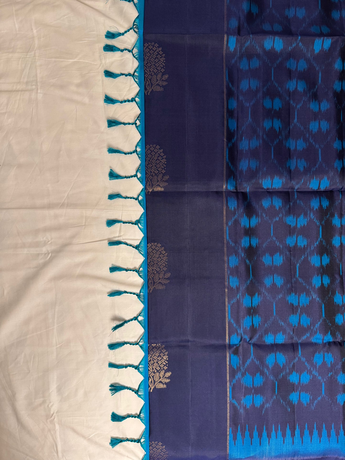Tārā – Midnight Blue Soft Silk Saree with Shining Pallu & Ikkat Touches