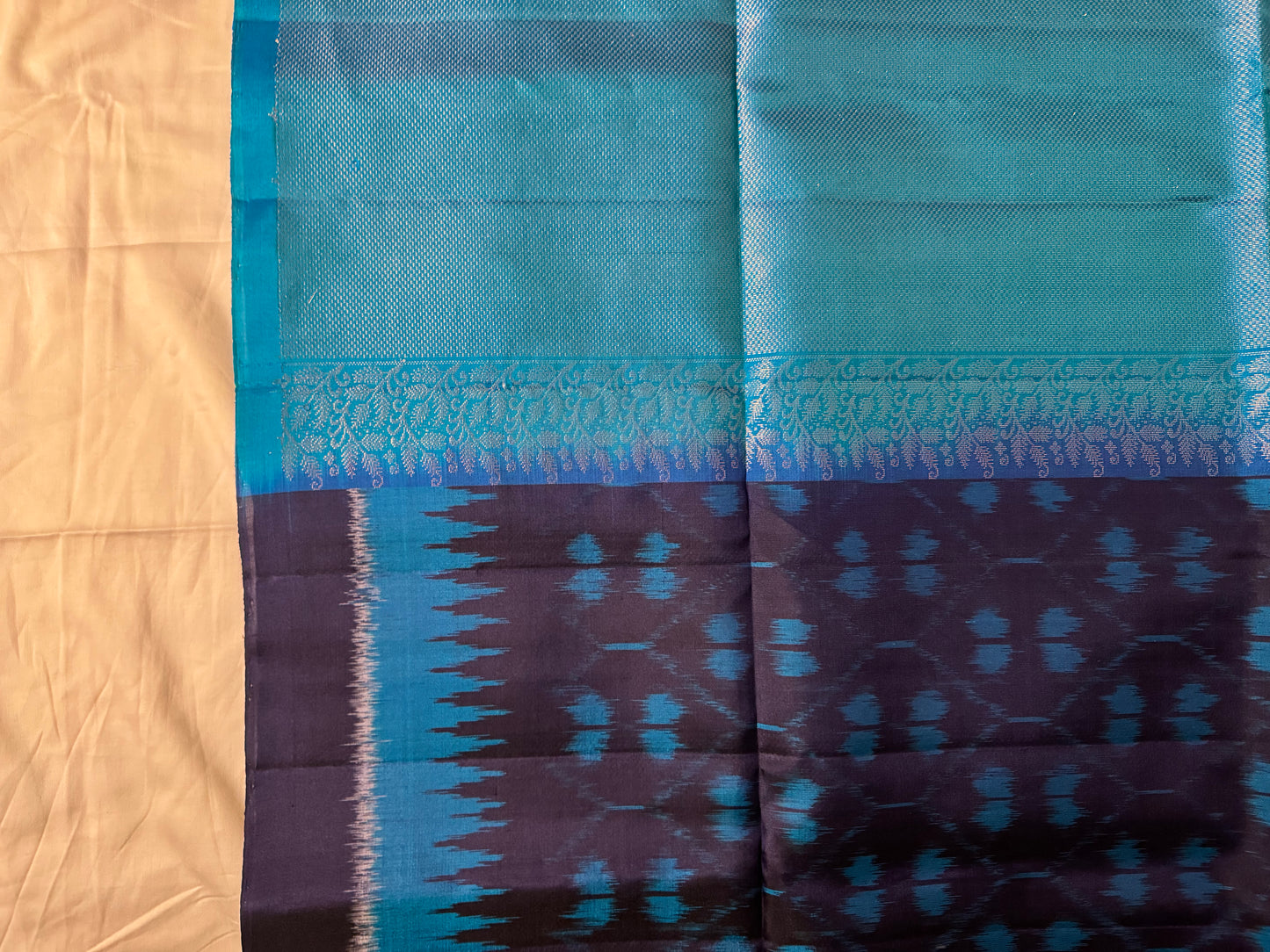 Tārā – Midnight Blue Soft Silk Saree with Shining Pallu & Ikkat Touches